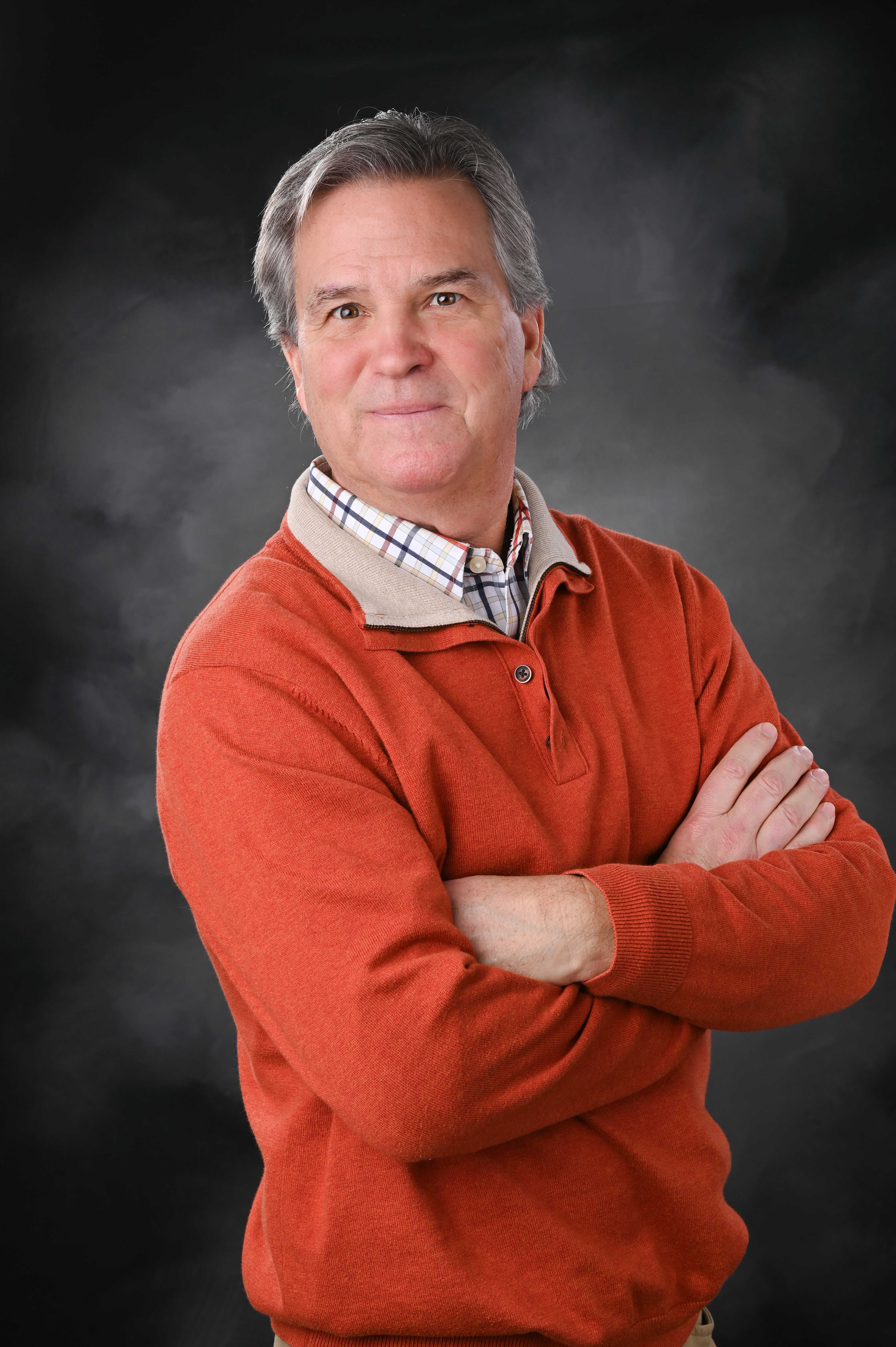 Picture of Jon Bagley in an orange vest.